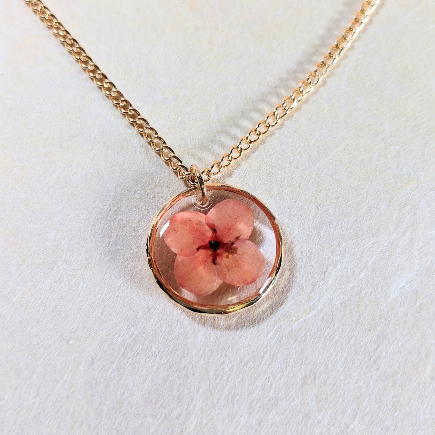 Resin jewellery making with pressed flowers